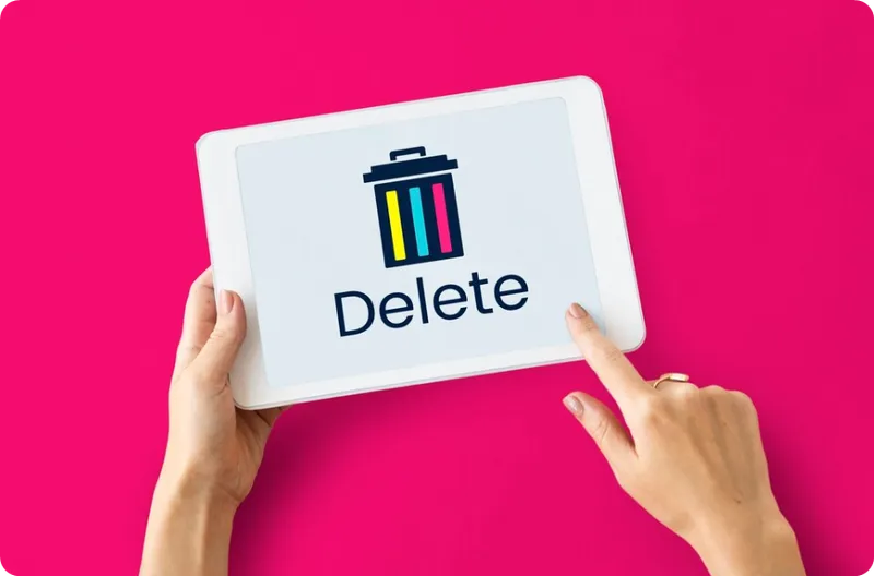 person tap delete on laptop person tap delete on laptop